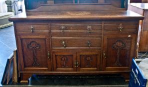 Large Art Nouveau Oak Sideboard, fitted with four drawers and four doors.