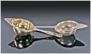 Sillver art deco tea strainers 2 in total. 1. Hallmark Birmingham 1933 37.5 grams 6.75 inches in