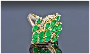Very Fine, 14ct Gold Set Emerald and Diamond Cluster Ring. Set with 15 Natural Columbian green oval