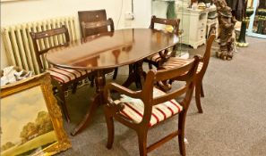 Regency Style Mahogany Dining Table and Six Chairs, comprising two carver chairs and four side