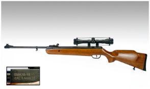 SMK 22 Full Powdered Air Rifle with telescopic sight. Barrel length 21.5``. Excellent condition.