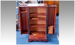 Modern Mahogany Side Cabinet and CD Rack, probably by Strongbow, the doors opening to reveal