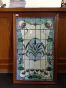 Medium Sized Art Nouveau Style Leaded Glass Window. multi-coloured decoration, with moulded wooden