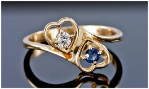 18ct Gold Diamond And Sapphire Dress Ring.