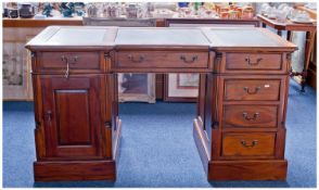 Georgian Style Mahogany Pedestal Desk, late 20th century, the top with three sectioned leathered