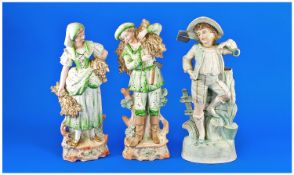 Pair of German Bisque Harvester Figures, each dressed in a romantic version of 18th century rustic