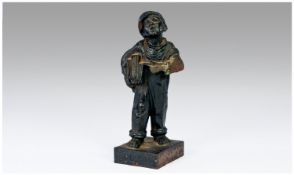Victorian Cast Iron Figure Street Seller Paperboy. The words SPESHUL to base. 6.5 inches tall.