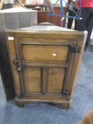 Jacobean Style Oak Corner Cupboard, of two-tier form, the upper section with arcaded panel to door,