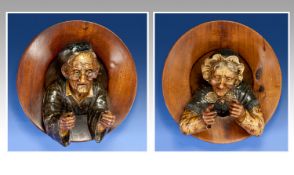 Austrian Fine Cold Painted Wall Plaques with the busts of an old man and old lady in 3D effect with