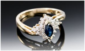 9ct Gold Dress Ring, Central Dark Blue Sapphire Surrounded By A Cluster Of Round Modern Brilliant