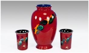 Poole Prestige Vase Within `Living Glaze` sprayed and painted design on red colourway. Stands 8.