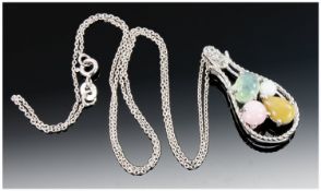 A Pear Shaped Silver Pendant Set With Pink, Yellow, White & Blue Opals on a silver chain.