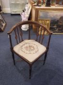 Edwardian Mahogany Corner Chair, with boxwood stringing, the back with shaped splats, padded seat