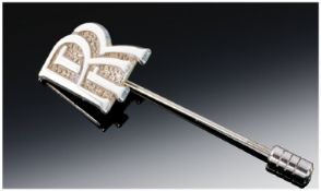 Rolls Royce Interest. A Sterling Silver Lapel Pin featuring the ``RR`` insignia. Stamped sterling