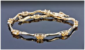 9ct Gold Diamond And Citrine Set Bracelet.