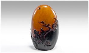 A Finely Carved, Chinese, Two-Tone, Shoushan `Pebble` the illustration is of figures in a landscape