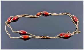 Victorian 10ct Gold Long Chain/Necklace. Interspaced with amber coloured stones. Stamped 10ct. 14.