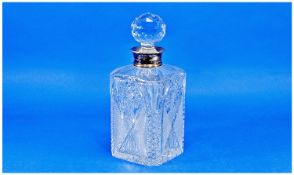 Large Cut Glass Decanter, of square form, multi-faceted stopper, silver band to neck, hallmarked
