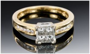 18ct Gold Diamond Ring 4 Central Princess Cut Diamonds Between 10 Channel Set Round Brilliant Cut