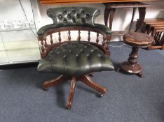 Traditional Green Leather Swivelling Captains Chair, beech frame, with deep buttoned seat and back,