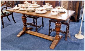 Large Oak Refectory Table, the top raised on substantial cup and cover supports, standing on a
