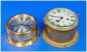 Brass Cased Ship`s Clocks (2) in total comprising Dutch clock `Vetus` and one other.
