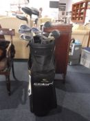 One Set of Golf Clubs in a Cobra Bag.