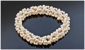 Cultured Freshwater Ivory White Pearl Bracelet, high lustre pearls threaded in a woven technique on