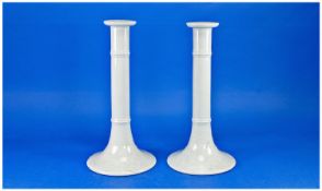 Pair of Copeland White Telescopic Candleholders, raised on spreading feet, measuring 12 inches