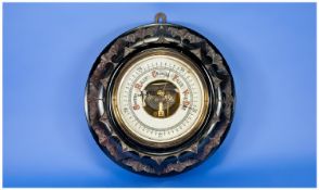 Edwardian Carved Wooden Circular Aneroid Wall Barometer with porcelain dial. 9x9``