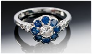 Platinum Diamond And Sapphire Cluster Ring, Central Round Diamond Surrounded By 8 Sapphires And