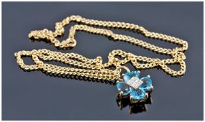 9ct Gold Pendant, Set With Blue Coloured Heart Shaped Stones And Four Central Diamonds.