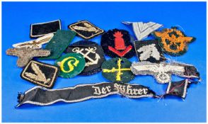 Bag of Assorted WW2 German Cloth Badges. Most with some damage. Sold AF.