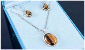 Silver Earrings And Pendant Suspended On Rounded Box Link Chain, Mounted With Tigers Eye.