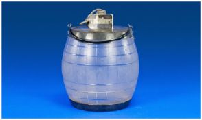 A Glass Biscuit Barrel with silver plated lid and hinged handle. 7 inches high and approximately 5