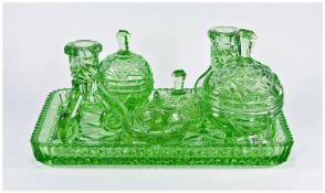 Mid 20th Century Green Pressed Glass Dressing Table Set, comprising pair of candlesticks, two