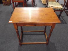 Oak Side Table, fitted with single drawer, raised on turned legs, joined by square stretchers, 27½