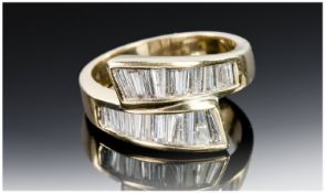 14ct Gold Diamond Ring, Channel Set With Two Rows Of Tapering Baguette Cut Diamonds. Stamped 14k,