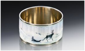 A Norwegian Silver and Guilloche Enamel Napkin Ring. Beautifully enamelled with a continuous scene