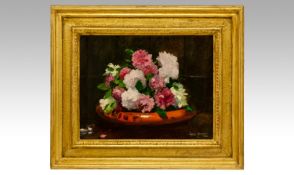 Owen Bowen ROI (1873-1967). Flowers in an orange bowl, Oil on Canvas. 16.5 by 20 inches. Signed.