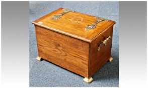 Early 20th Century Oak Carrying Case, the lid with decorative brass hinges, opening to reveal