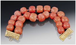 Tibetan 19th Century Natural Coral Two Row Bracelet with high carat gold clasps - marked; excellent