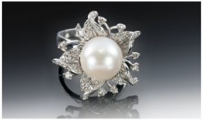 18ct White Gold Pearl and Diamond Cluster Ring, stamped 750, diamond weight 70 points, VS clarity,