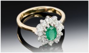 18ct Gold Emerald And Diamond Ring, Set With A Central Oval Emerald Surrounded By Round Modern
