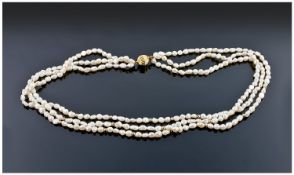 Triple Strand Fresh Water Pearl Necklace With 18ct Gold Clasp And Bauble Spacers, Length 19 Inches.