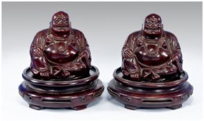 Pair Of Decorative Buddha Figures, Raised On Circular Bases.