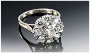 18ct Gold Diamond Cluster Ring, Set With A Central Round Brilliant Cut Diamond Estimated Weight .