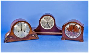 Collection of Three Early 20th Century Mantle Clocks, comprising Napoleon shaped mahogany mantle