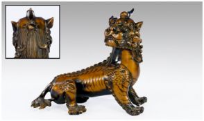 An Impressive Chinese Two Tone Bronze Statue of a Mythical ``Pi Xiu Dragon``, which is thought to