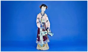 Large Oriental Lady, holding a violin, from Past Times, 20 inches high.